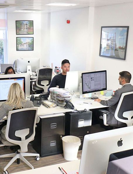 Made Architecture staff at work on pc's